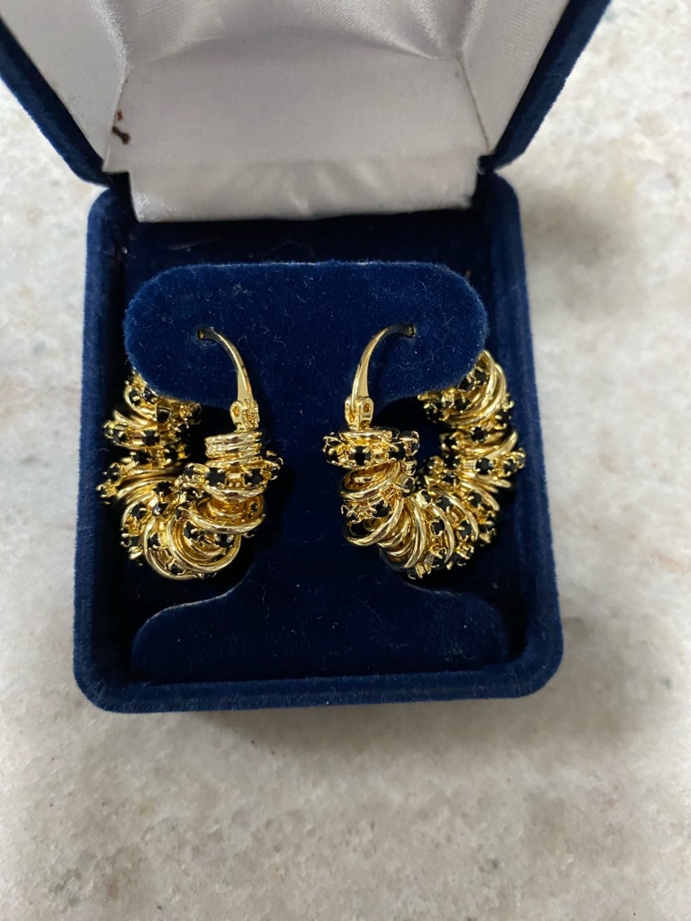 Gold Hoop Earrings with Black Crystal Accents - Picture 2 of 5